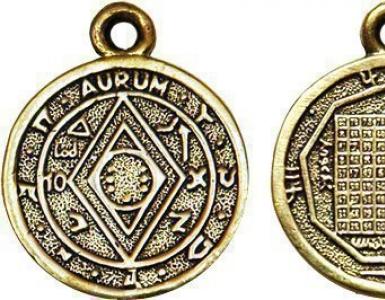 Rikdom talismaner i en lommebok for å tiltrekke penger Tiltrekkende pengepung laget av gule stoffmynter