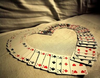 Fortune telling about a man's relationships using playing cards